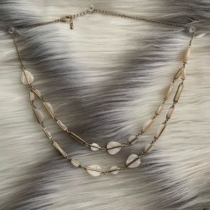 Gold and white necklace